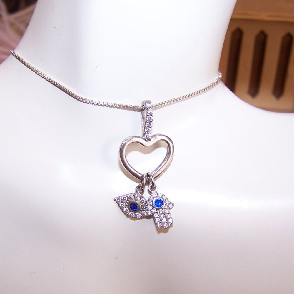 Sterling Silver Cubic Zirconia Heart Pendant with Evil Eye and Hamsa Charms